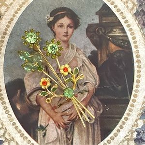 Vintage gold tone pin with green flowers